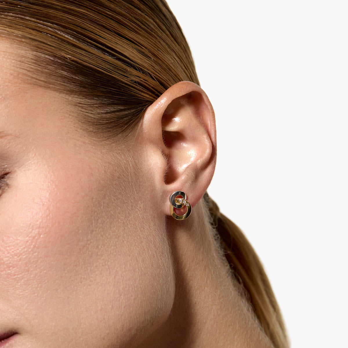 Pendientes doble círculo de oro bicolor 18K circonitas 13 mm