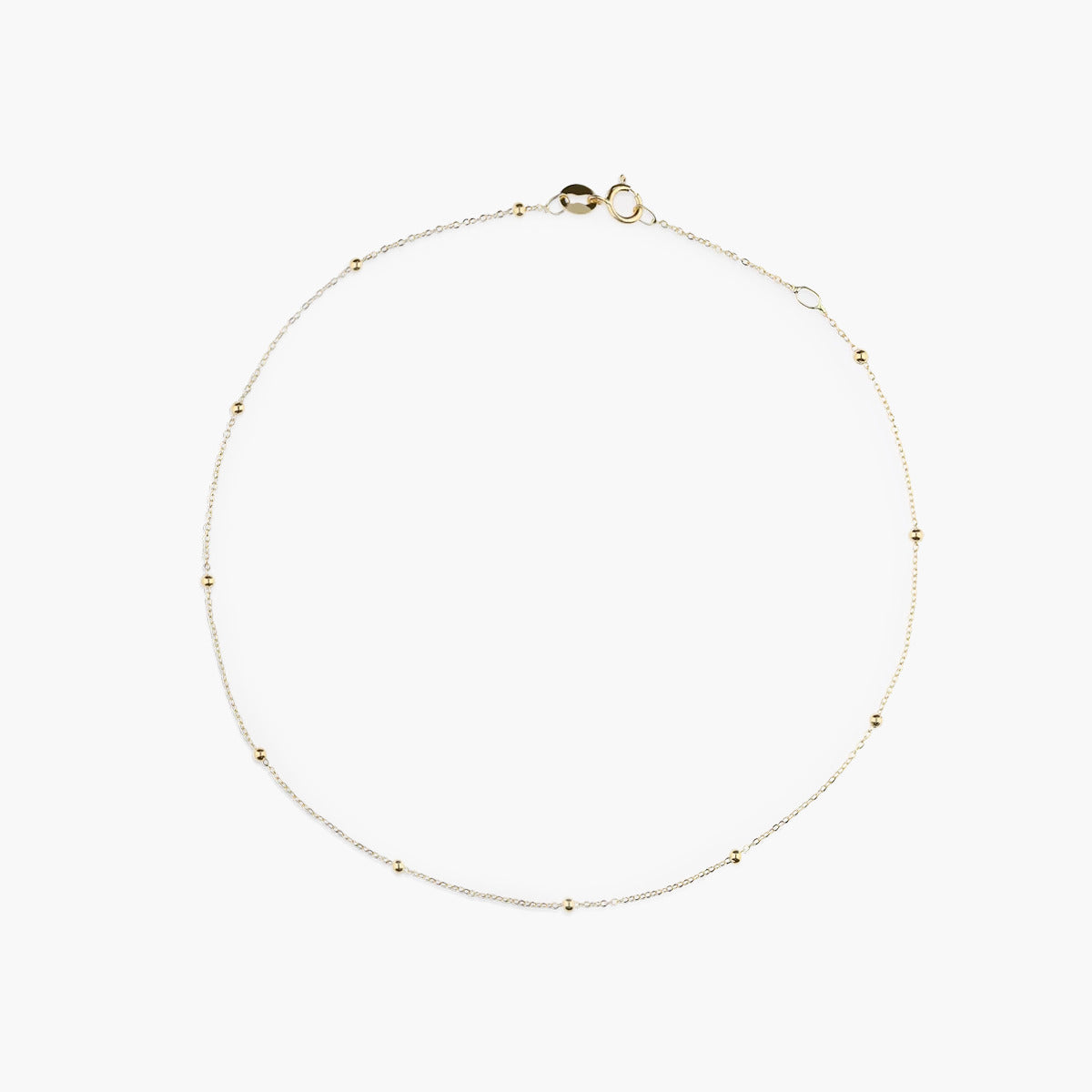 Tobillera bolitas de oro 18K 23 cm