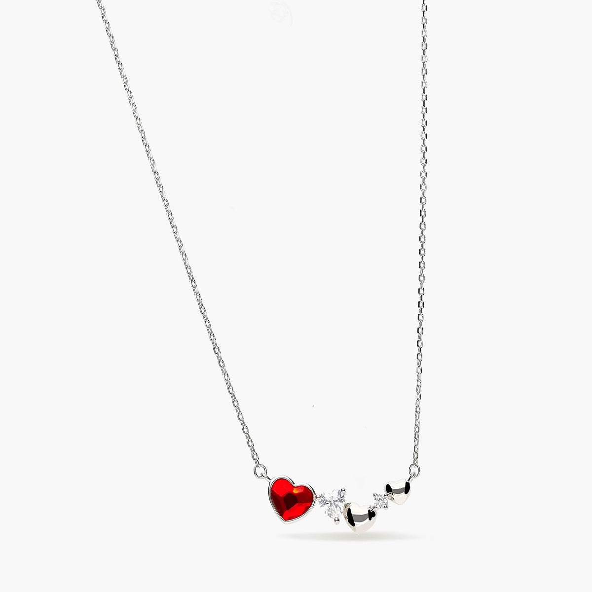 Collar corazones de plata 1ª ley circonitas y cristal rojo 22 mm