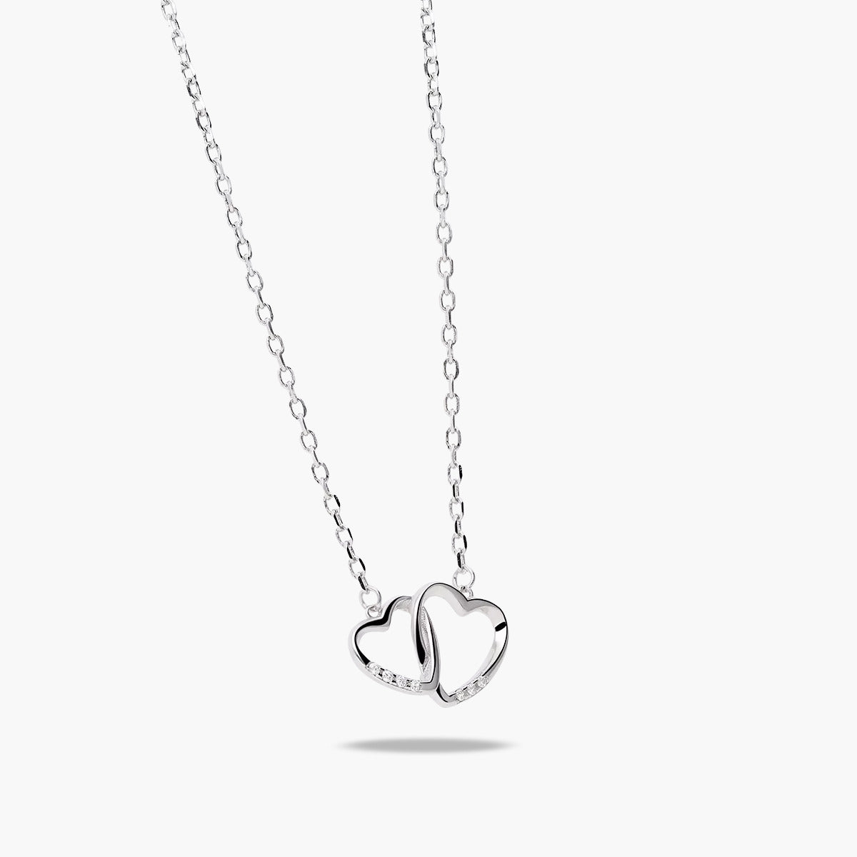 Collar doble corazón de plata 1ª ley circonitas 15 mm