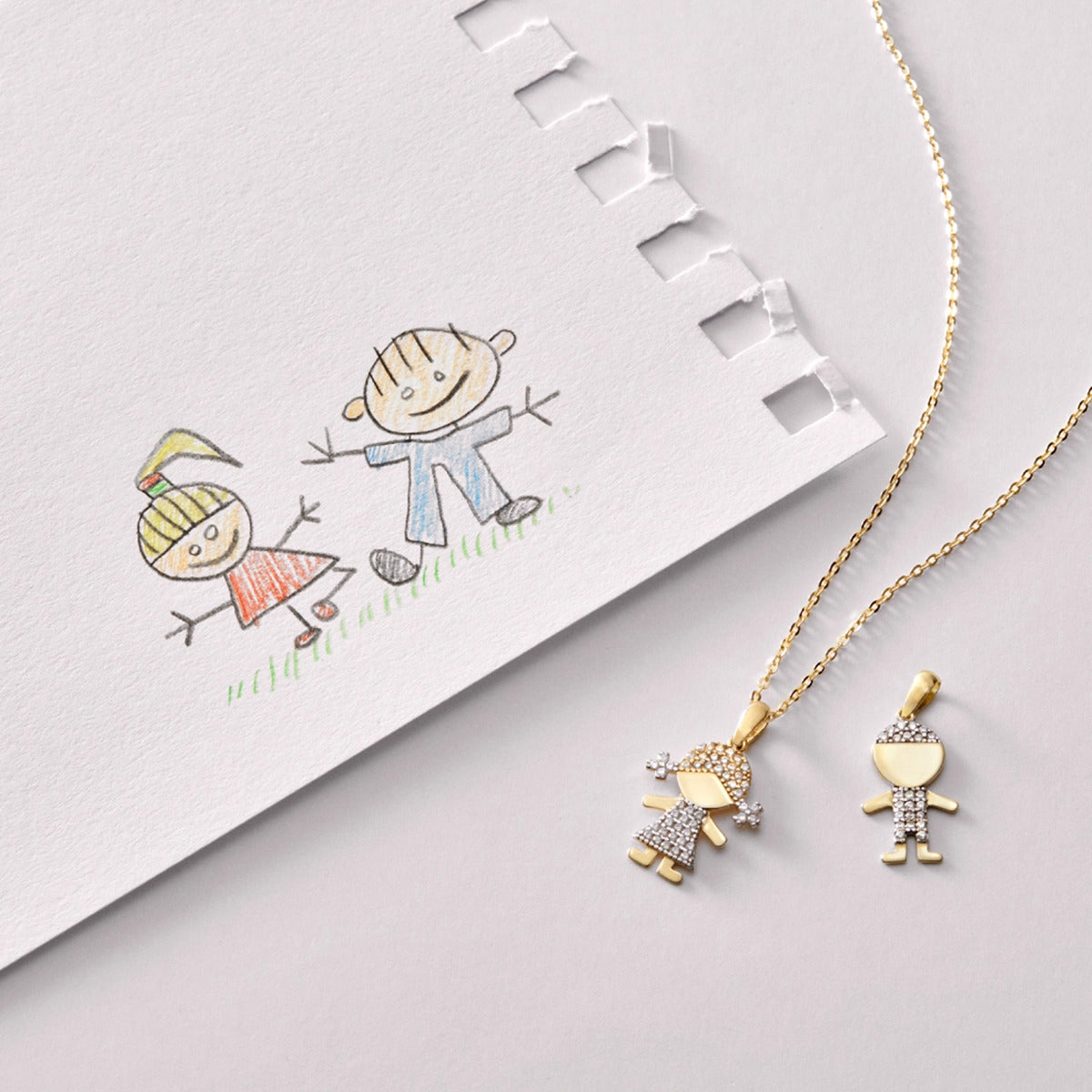 Colgante niño de oro bicolor 18K