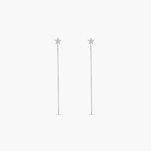 Pendientes largos estrella de oro blanco 18K diamante natural 0.13 ct. 60 mm