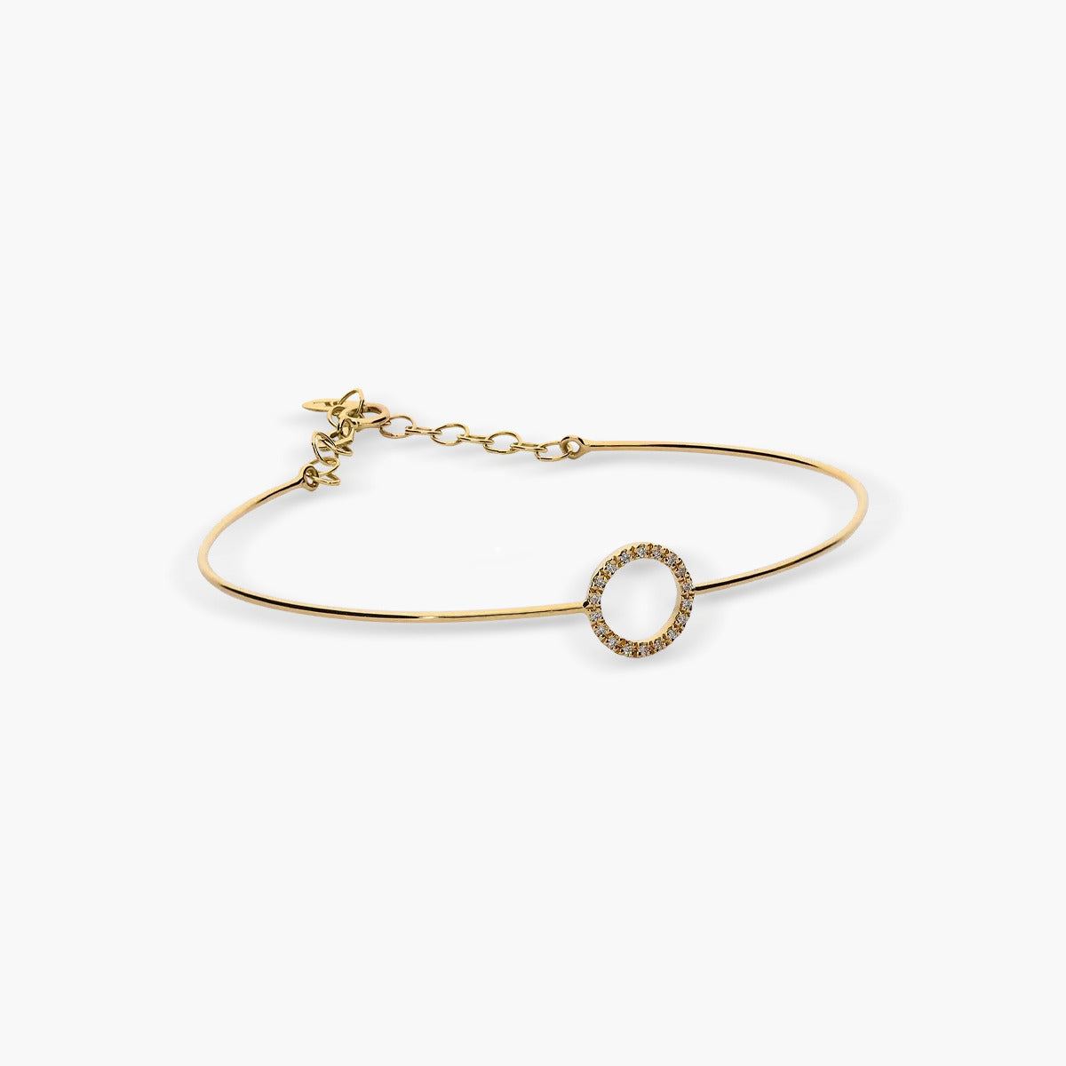 Pulsera rígida círculo de oro 18K diamante natural 0.07 ct. 55x50 mm