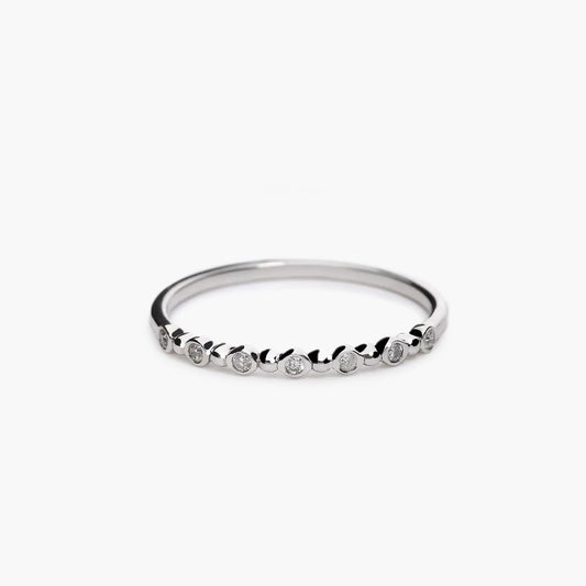 Anillo de oro blanco 18K diamante natural 0.07 ct.