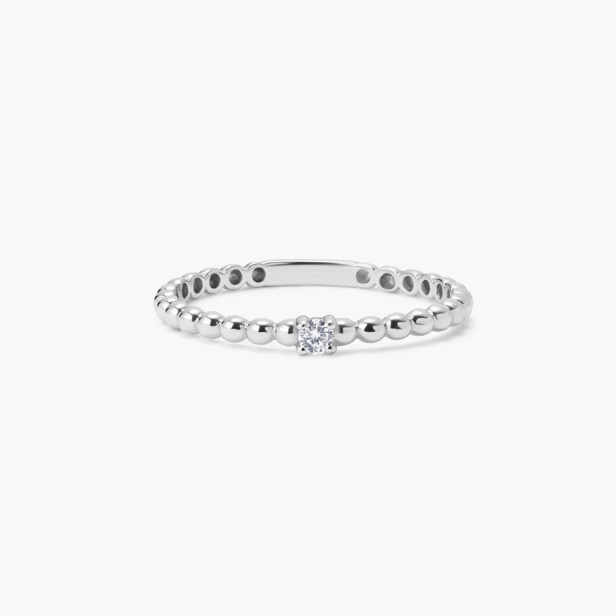 Anillo de oro blanco 18K diamante natural 0.04 ct.