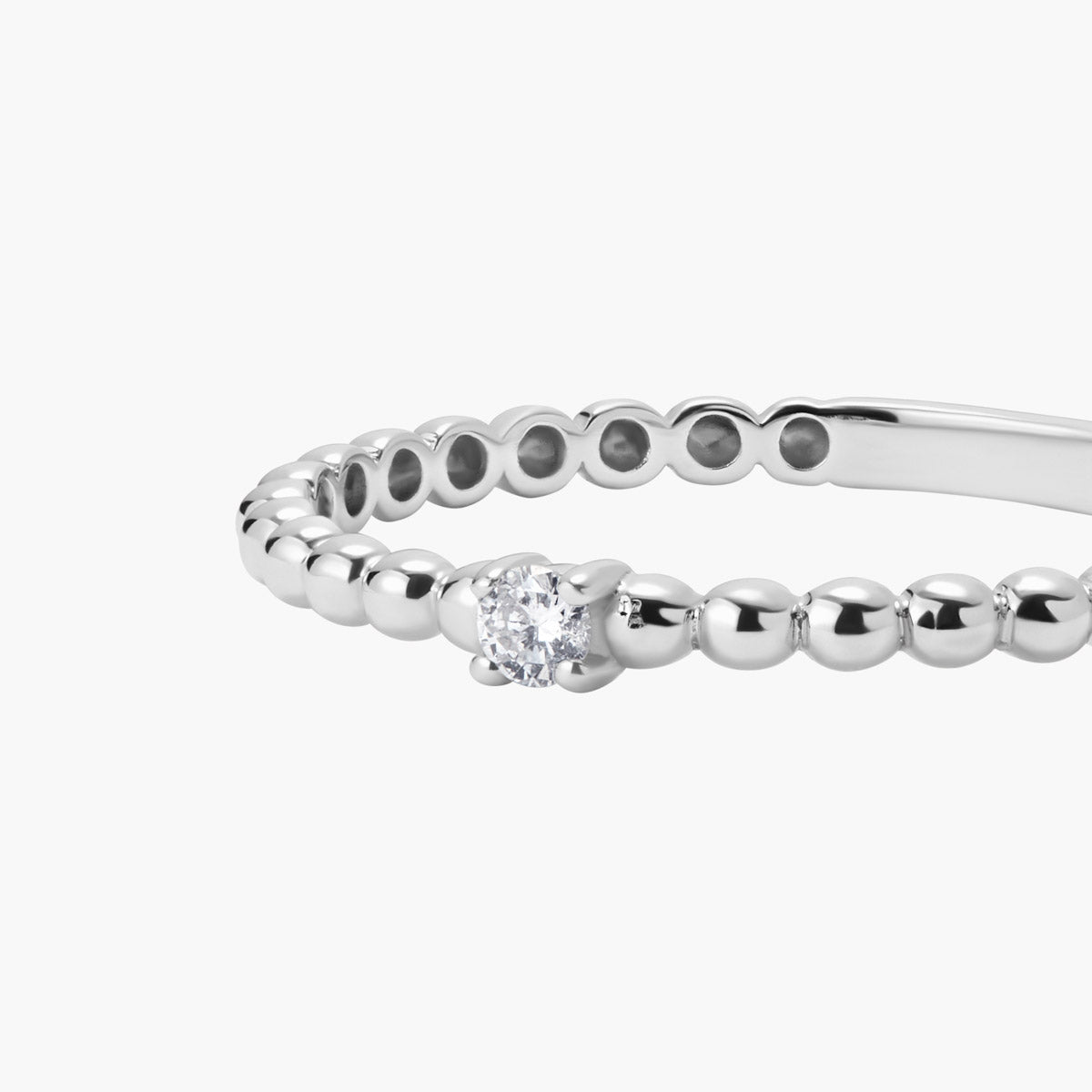 Anillo de oro blanco 18K diamante natural 0.04 ct.