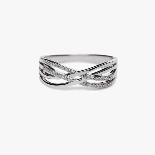 Anillo de oro blanco 18K diamante natural 0.085 ct. STARLACE