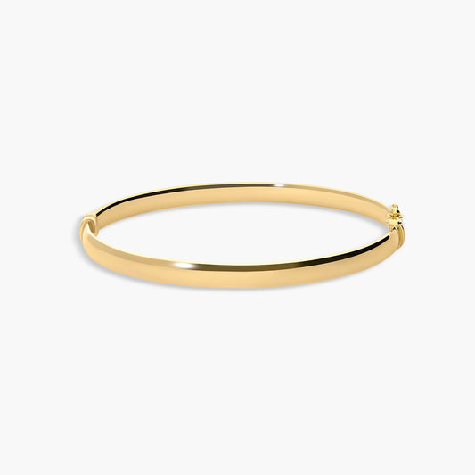 Pulsera rígida oval de oro 18K 50x60 mm
