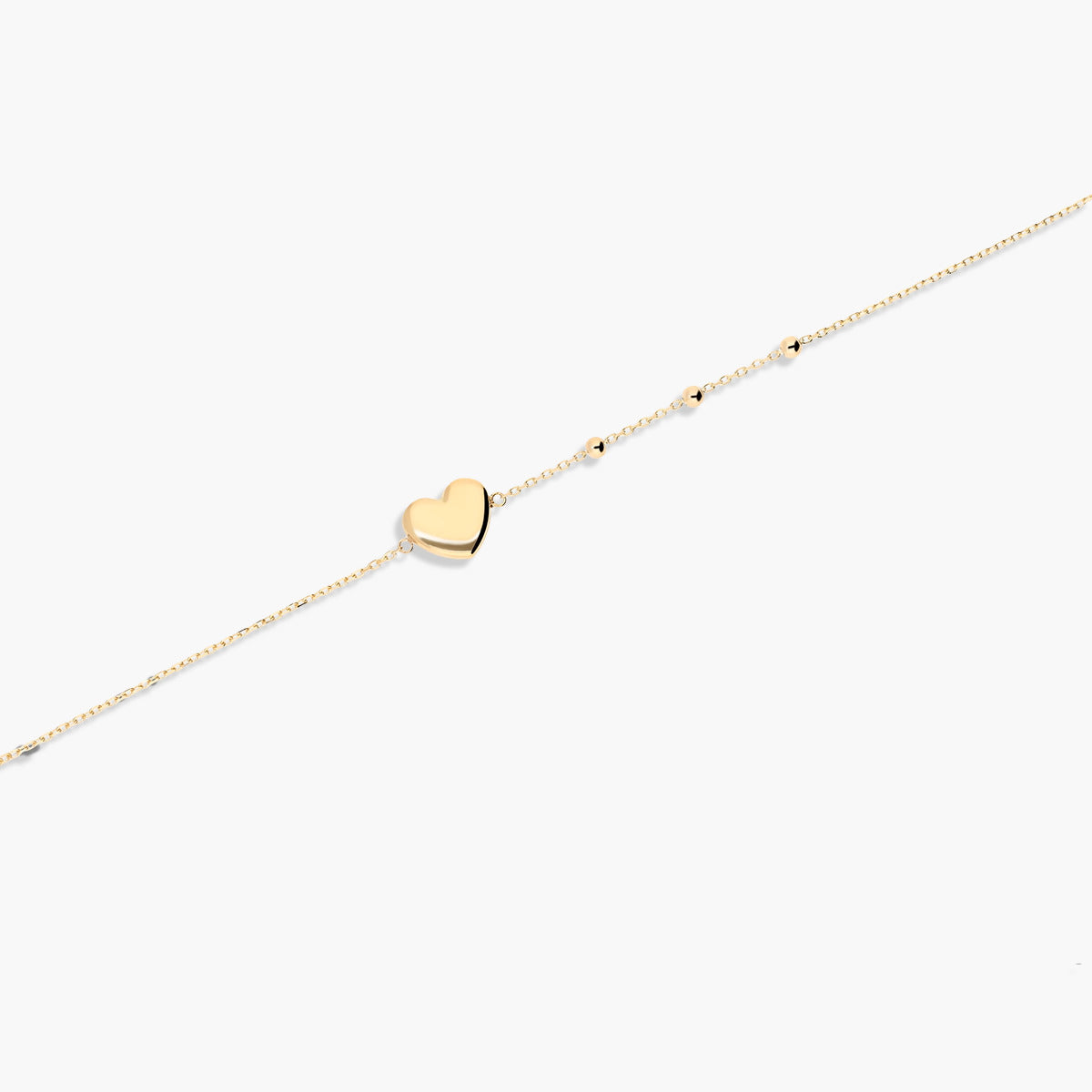 Pulsera de oro 18K corazón y cadena con bolitas 16-18 cm