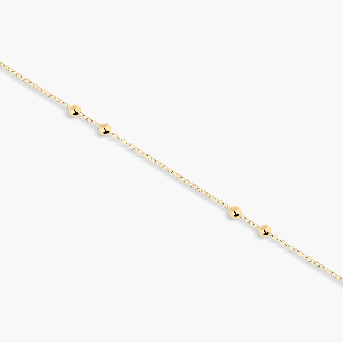 Tobillera bolitas de oro 18K 23 cm