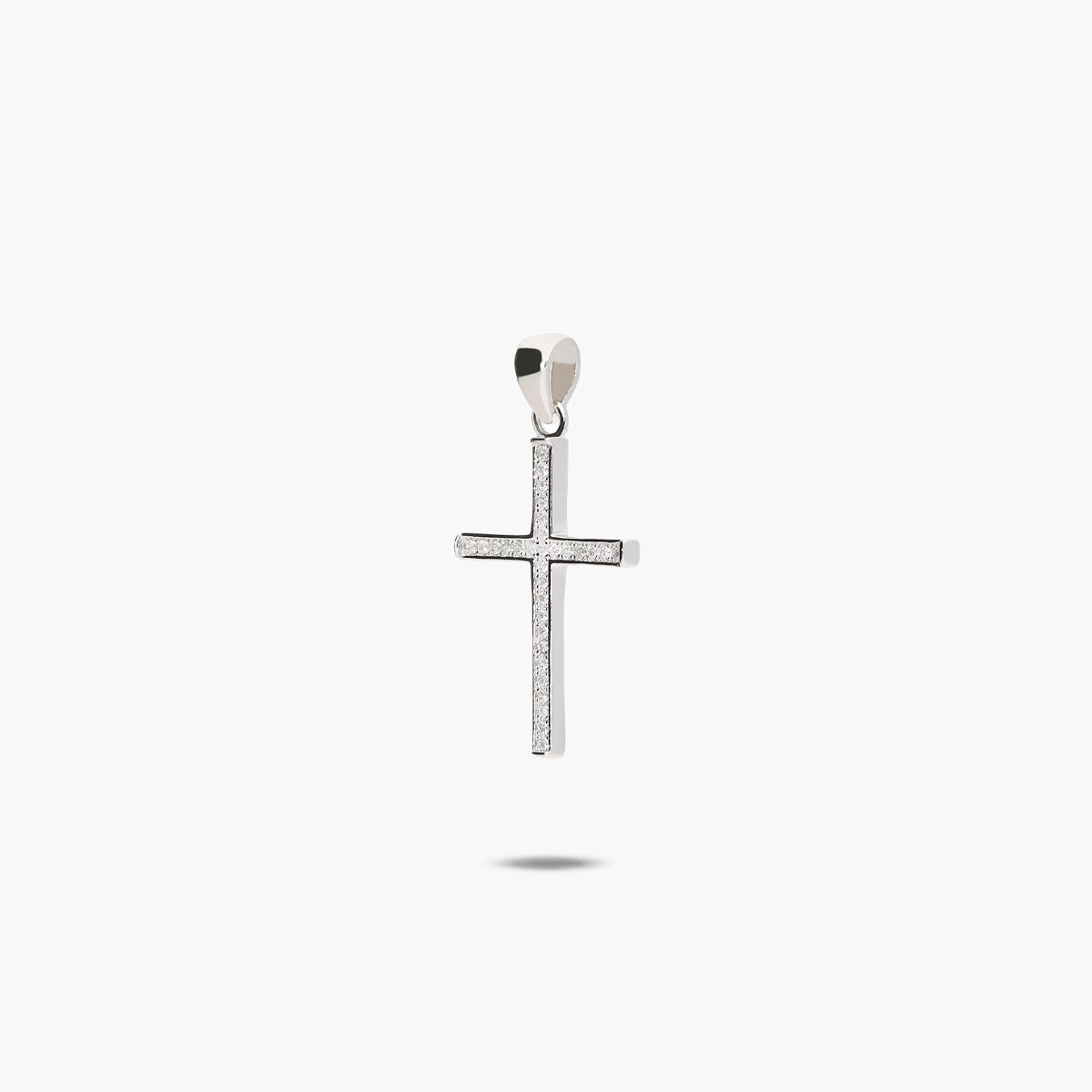 Cruz de plata de 1ª ley circonitas en canal 22 mm