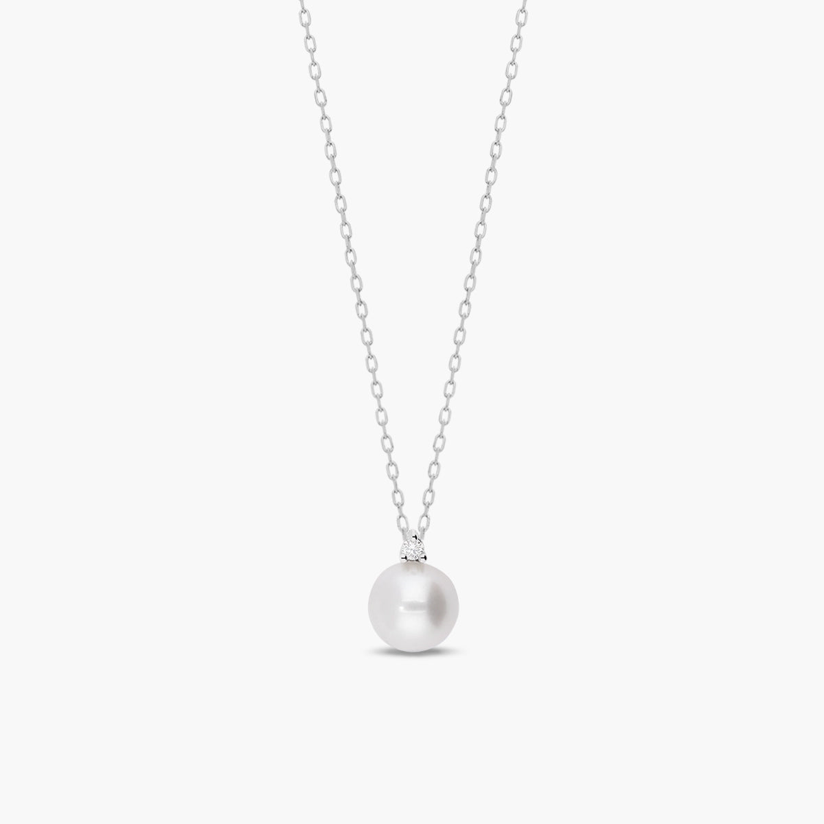 Collar de oro blanco 18K diamante natural 0.02 ct. perla 7 mm