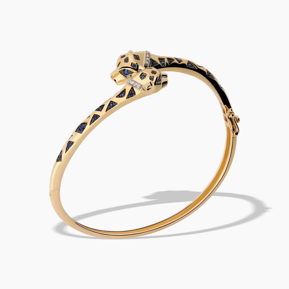 Pulsera rígida de oro 18K diamante natural 0.04 ct. 60x50 mm JAGUAR