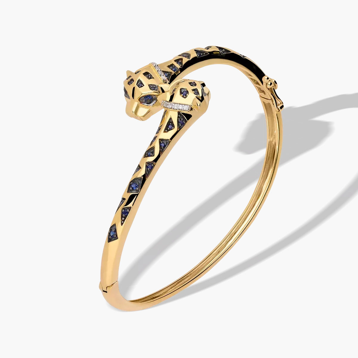 Pulsera rígida de oro 18K diamante natural 0.04 ct. 60x50 mm JAGUAR