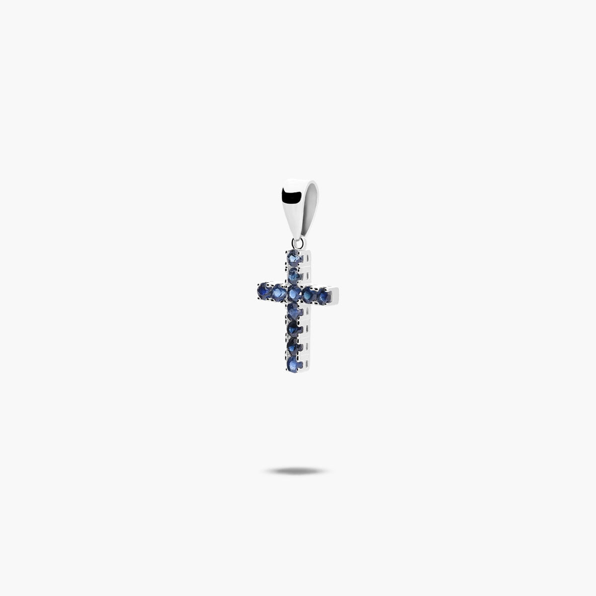 Cruz de oro blanco 18K zafiro