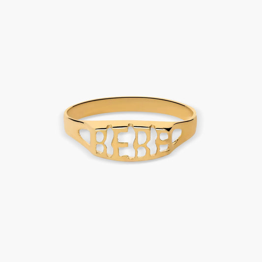 Sello bebé oval calado de oro 18K