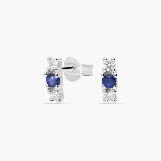 Pendientes de oro blanco 18K diamante natural 0.10 ct. zafiro 7 mm