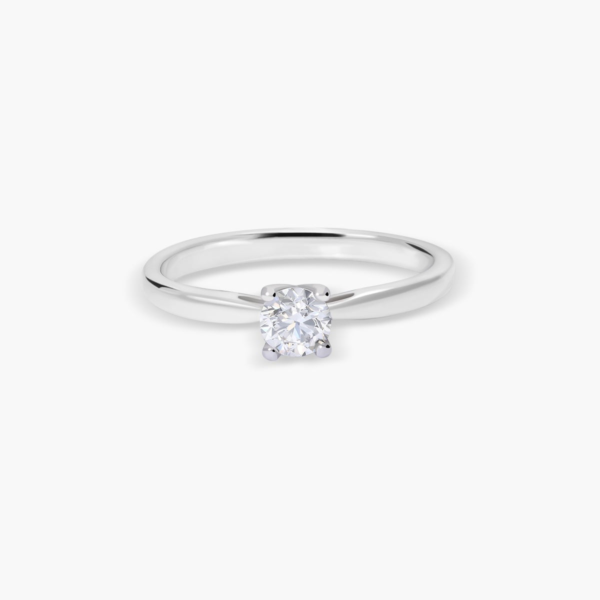 Anillo de oro blanco 18K diamante natural 0.3 ct.
