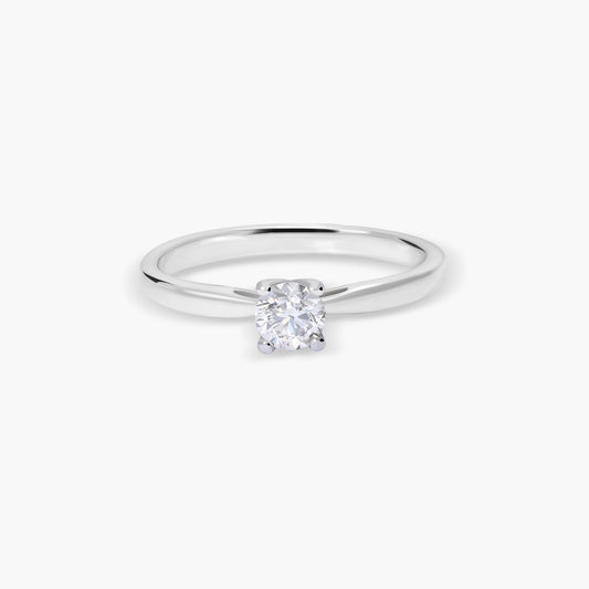 Anillo de oro blanco 18K diamante natural 0.3 ct.