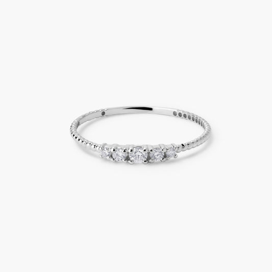 Anillo de oro blanco 18K diamante natural 0.13 ct. 