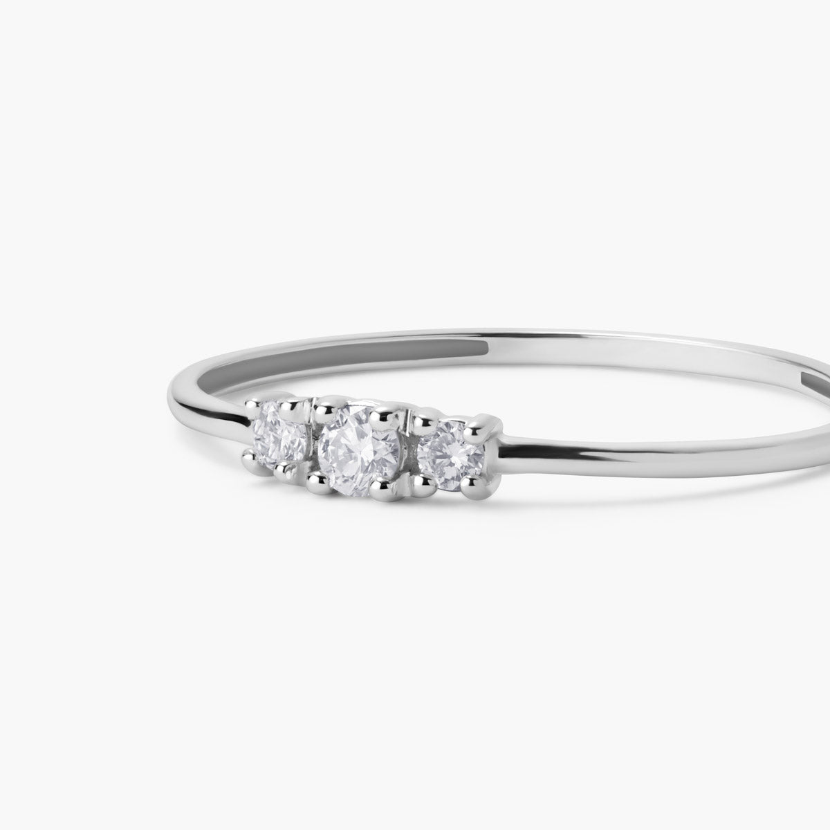 Anillo de oro blanco 18K diamante natural 0.1 ct. 