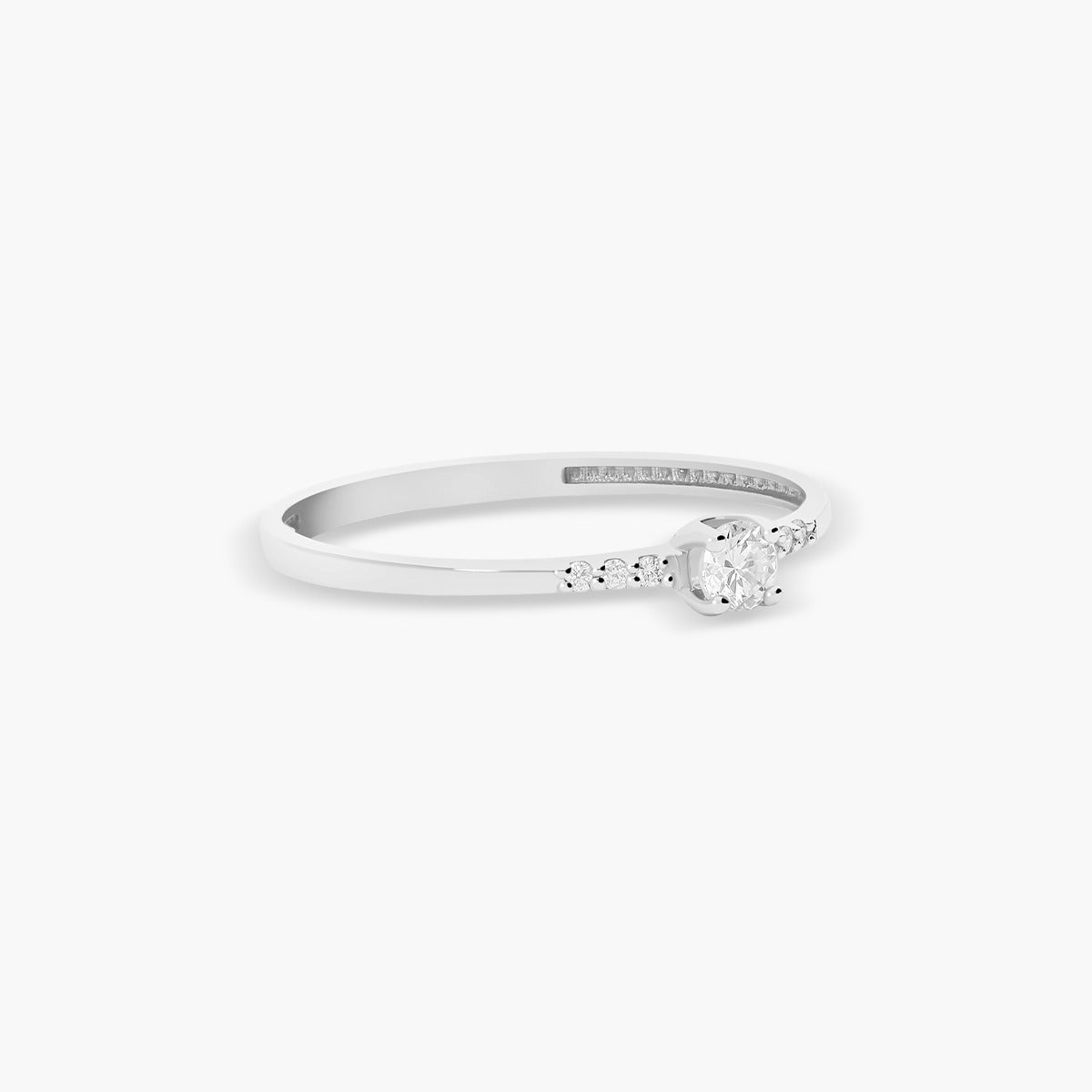 Anillo de oro blanco 18K diamante natural 0.124 ct.