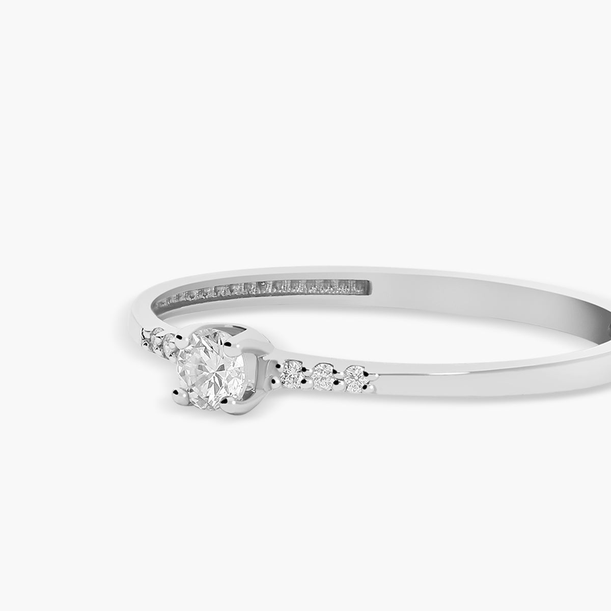 Anillo de oro blanco 18K diamante natural 0.124 ct.