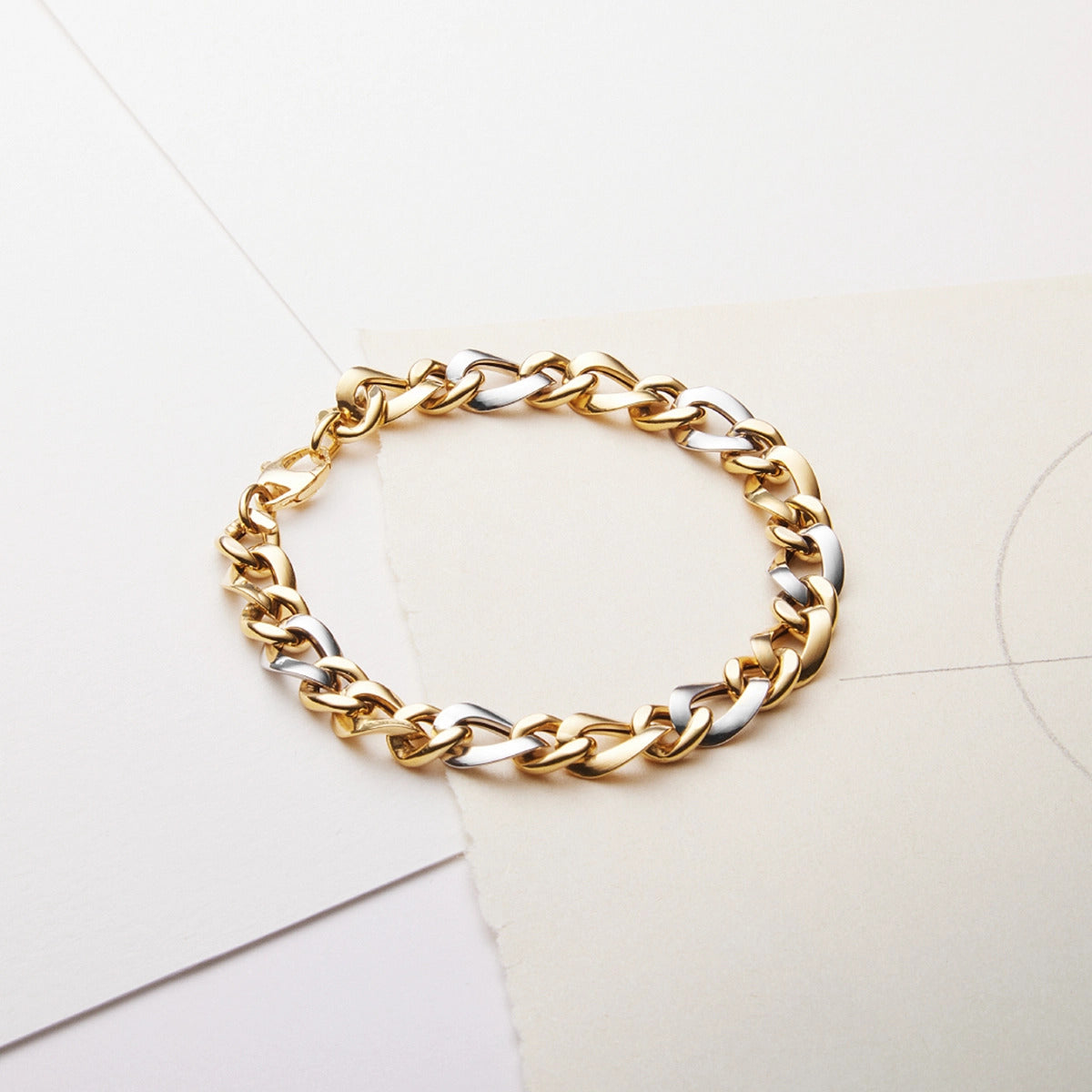 Pulsera de oro bicolor 18K eslabón anillas 20 cm