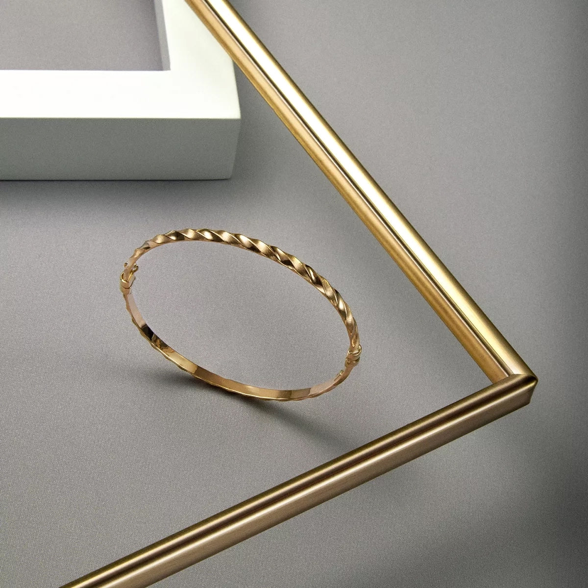 Pulsera rígida rizada de oro 18K 50x60 mm