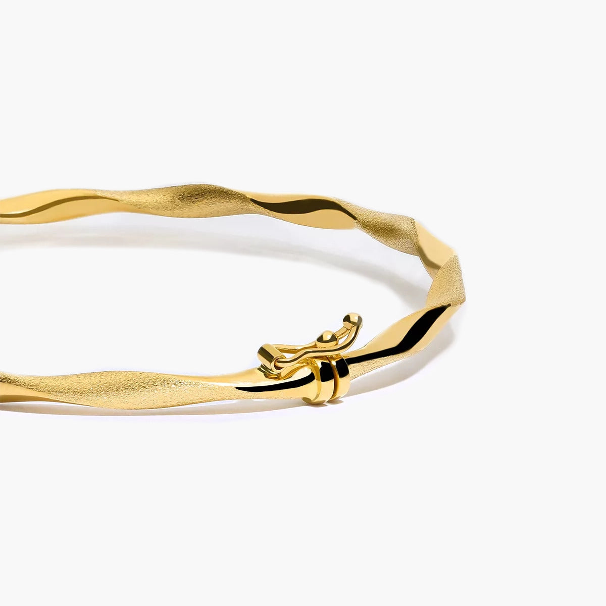 Pulsera rígida rizada de oro 18K 50x60 mm