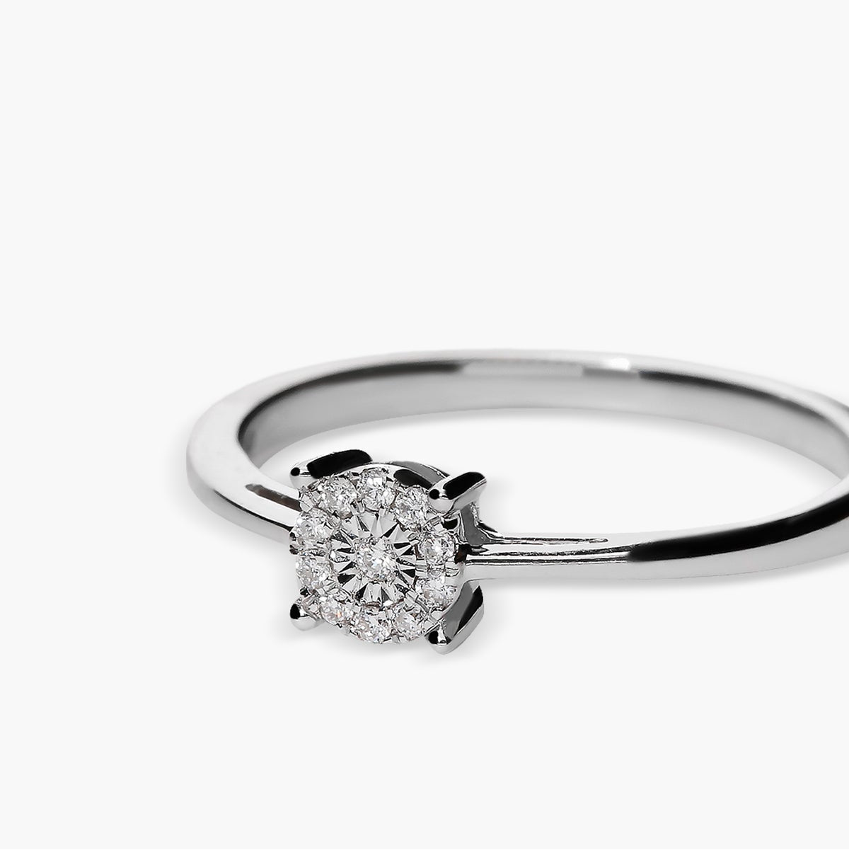 Anillo de oro blanco 18K diamante natural 0.06 ct. 
