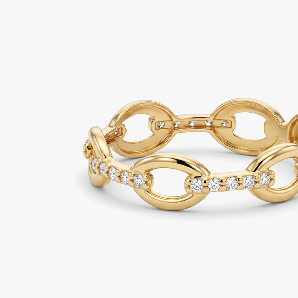 Anillo eslabones de oro 18K circonitas