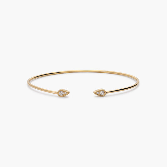 Pulsera rígida de oro 18K diamante natural 0.12 ct. 55x45 mm