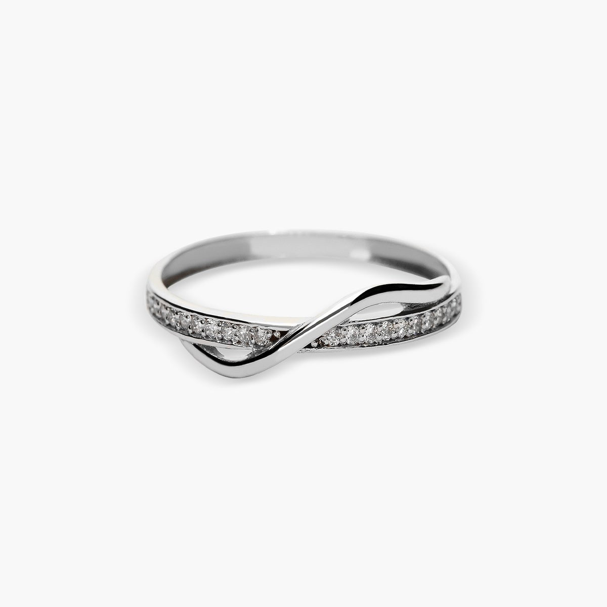 Anillo de oro blanco 18K diamante natural 0.105 ct.
