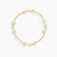 Pulsera infantil de oro 18K con perlas y motivos de flor 17 cm
