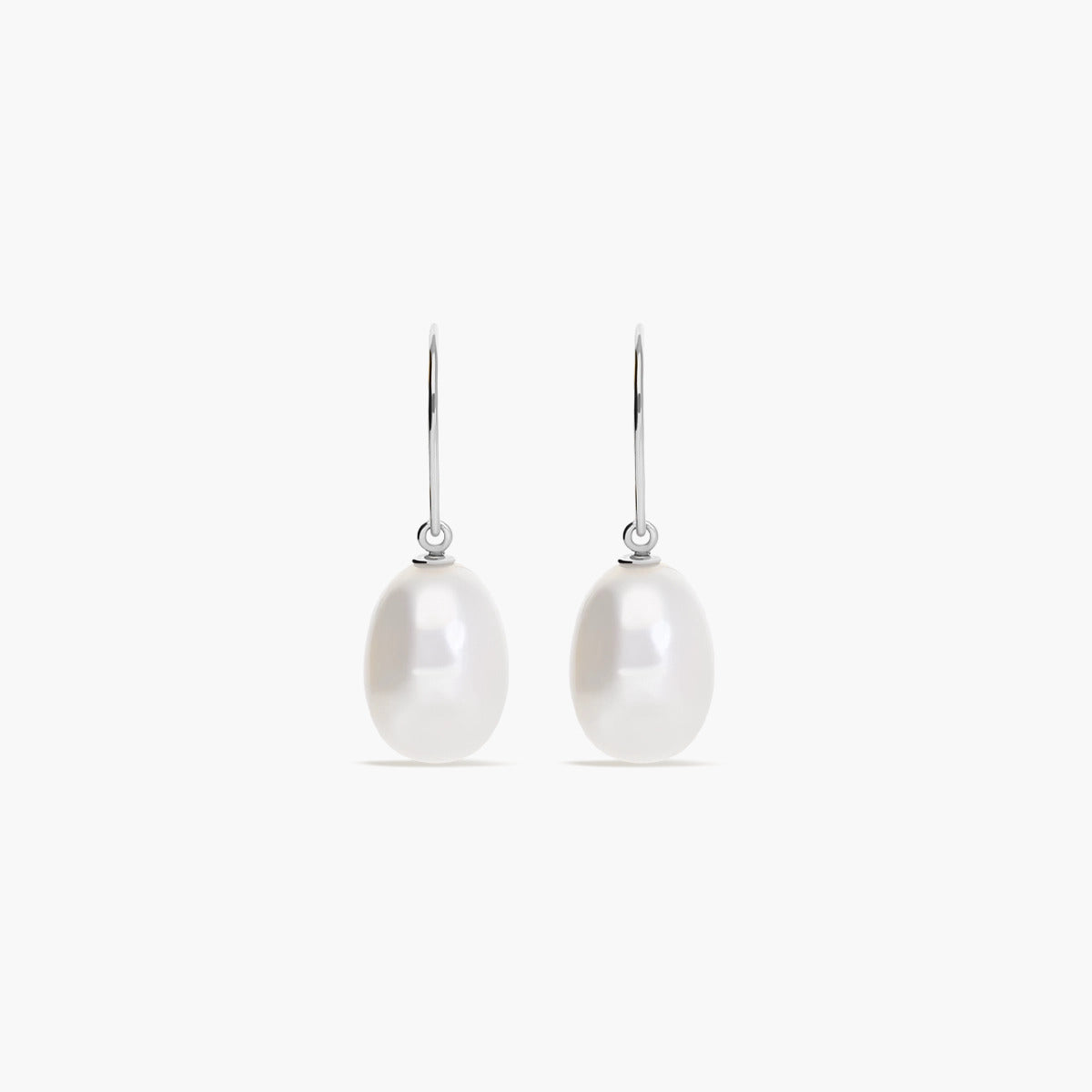 Pendientes largos de oro blanco 18K con perlas 25 mm