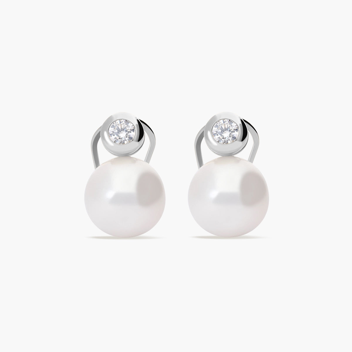 Pendientes de oro blanco 18K con perlas y circonitas 14 mm