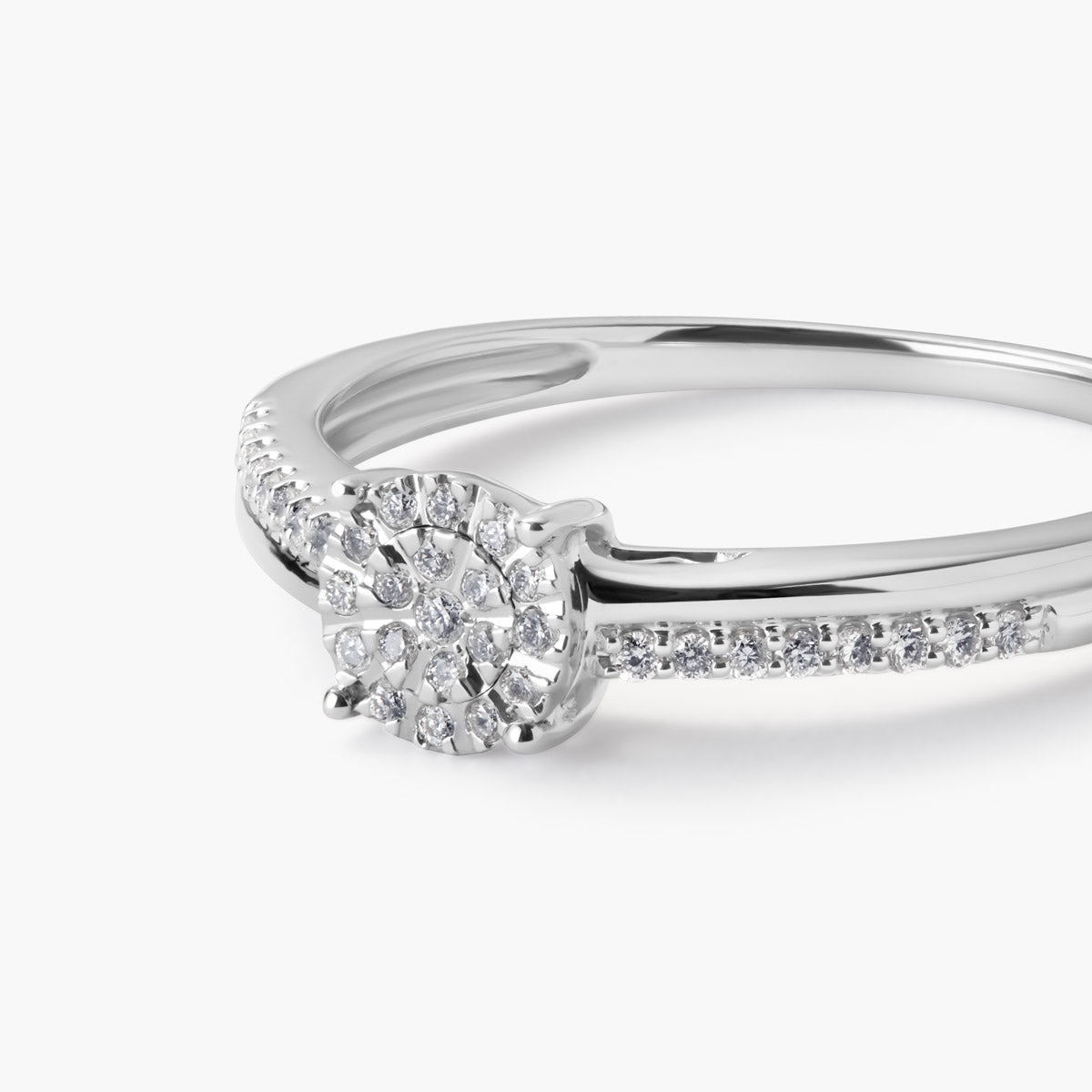 Anillo de oro blanco 18K diamante natural 0.11 ct. 