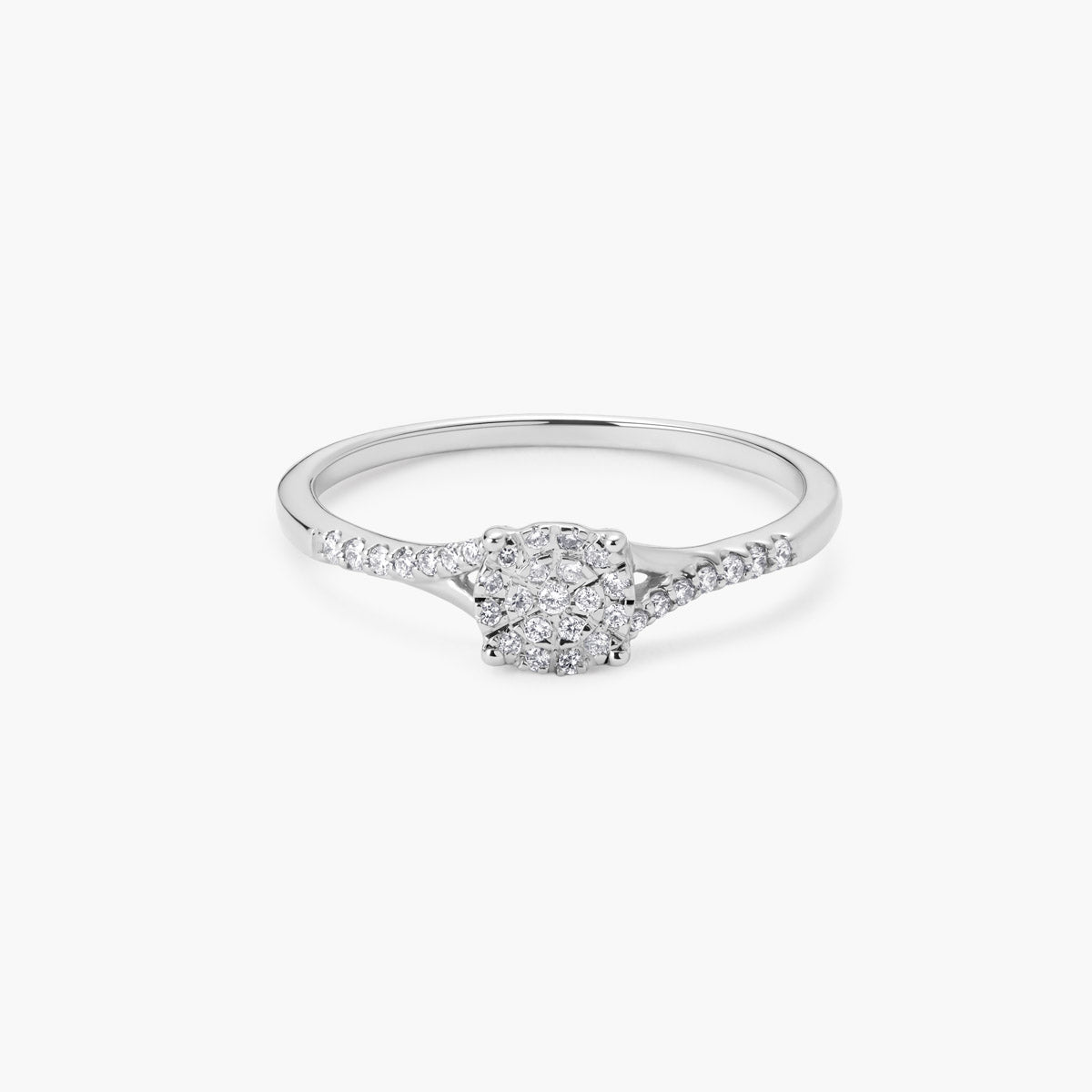 Anillo de oro blanco 18K diamante natural 0.11 ct. 