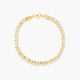 Pulsera de oro bicolor 18K eslabón espiga 19 cm