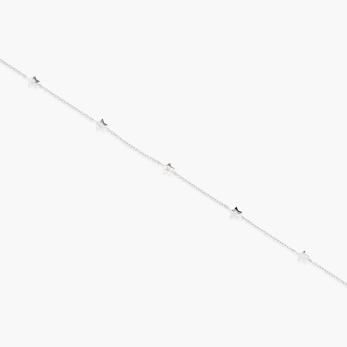 Pulsera de oro blanco 18K diamante natural 0.03 ct. estrellas 18 cm