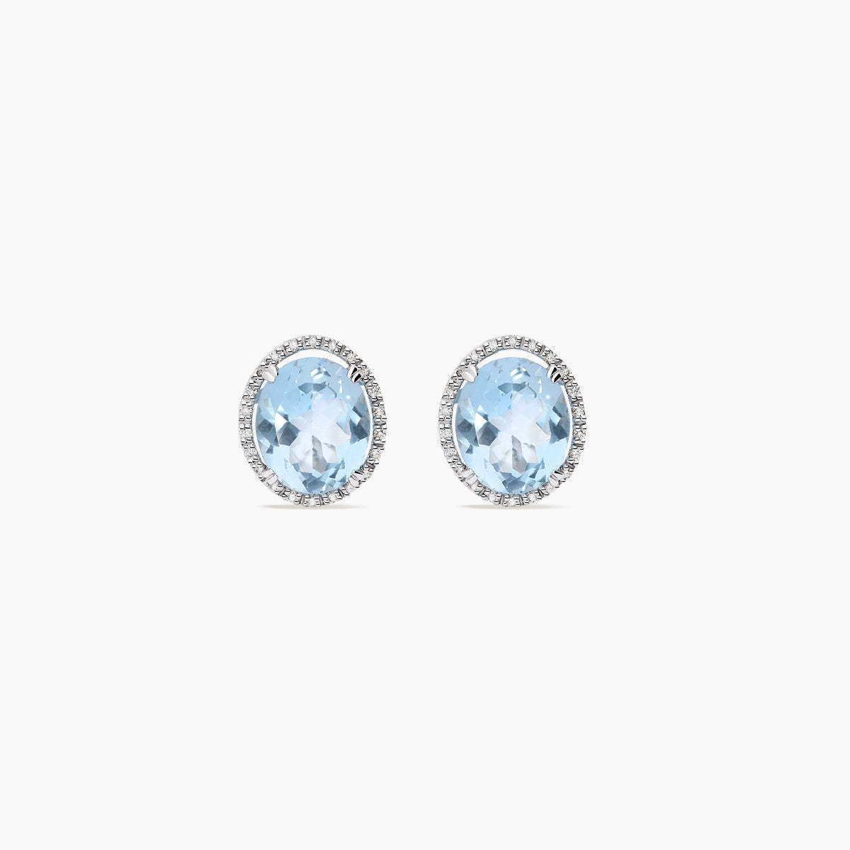 Pendientes de oro blanco 18K diamante natural 0.22 ct. topacio azul 7 mm OCEAN