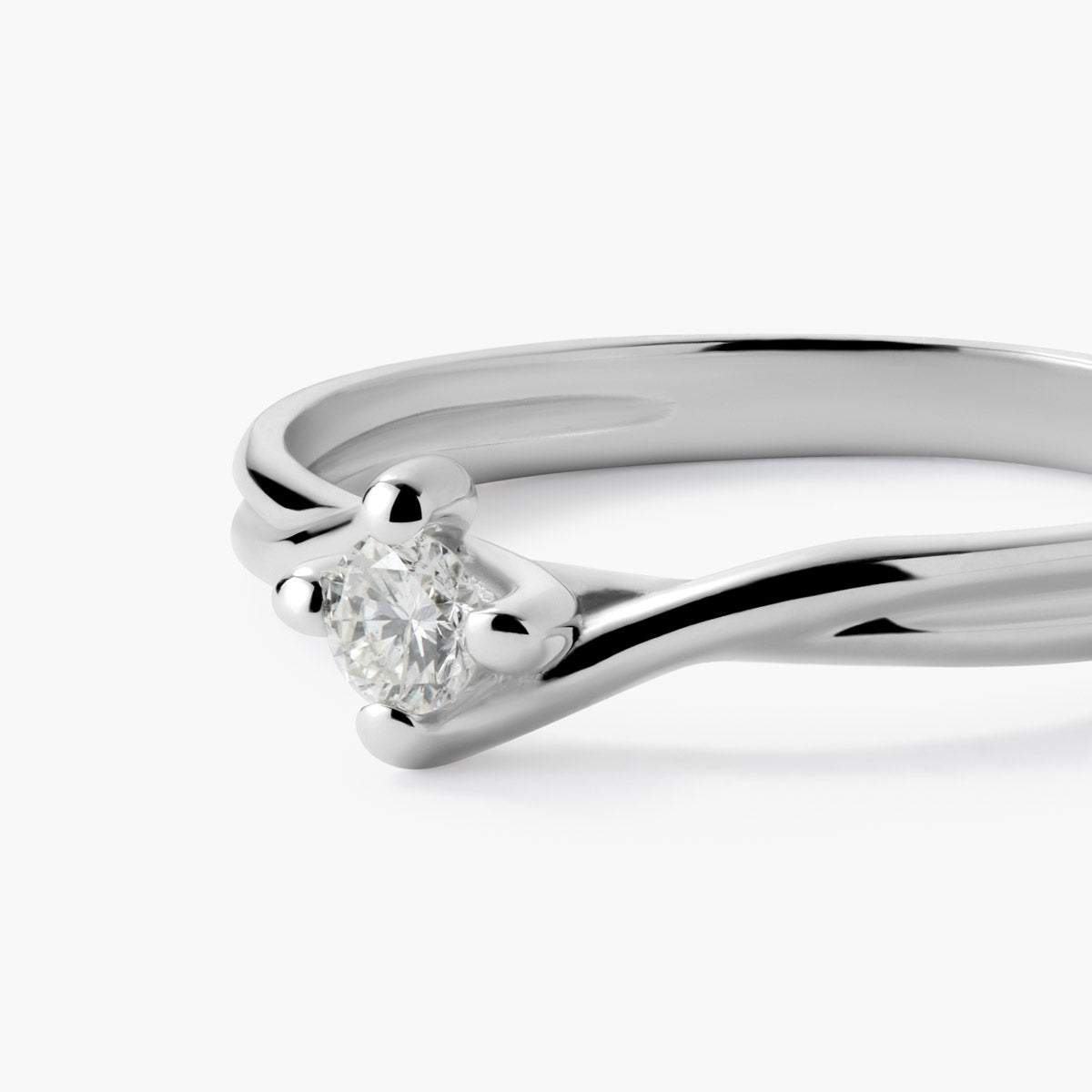 Anillo de oro blanco 18K diamante natural 0.1 ct. SWIRL