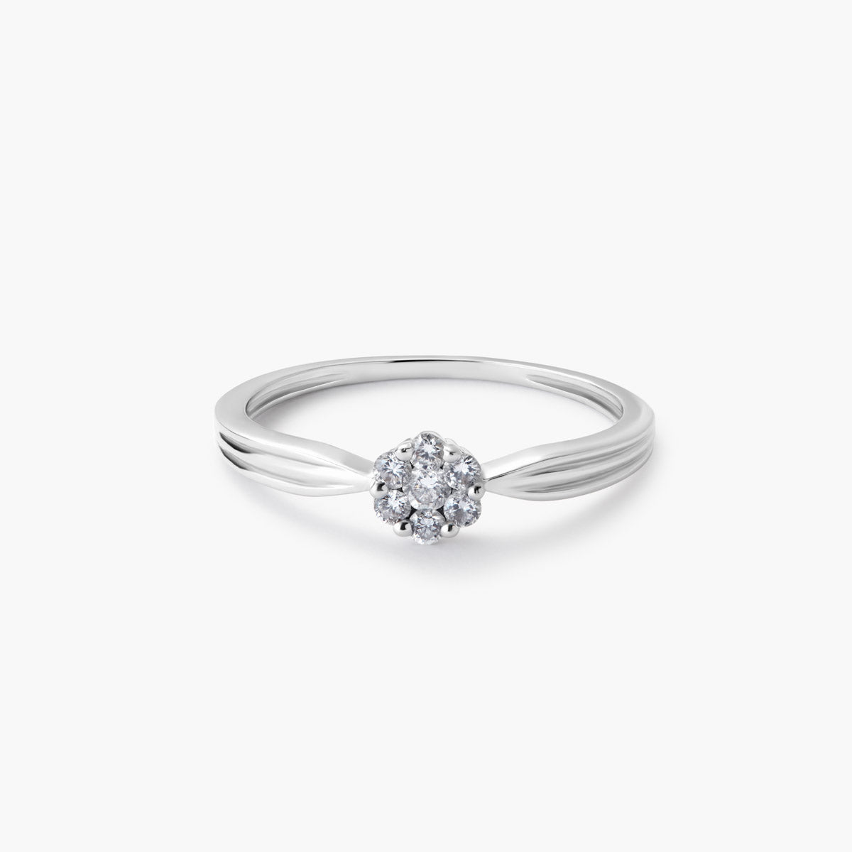 Anillo de oro blanco 18K diamante natural 0.15 ct. 