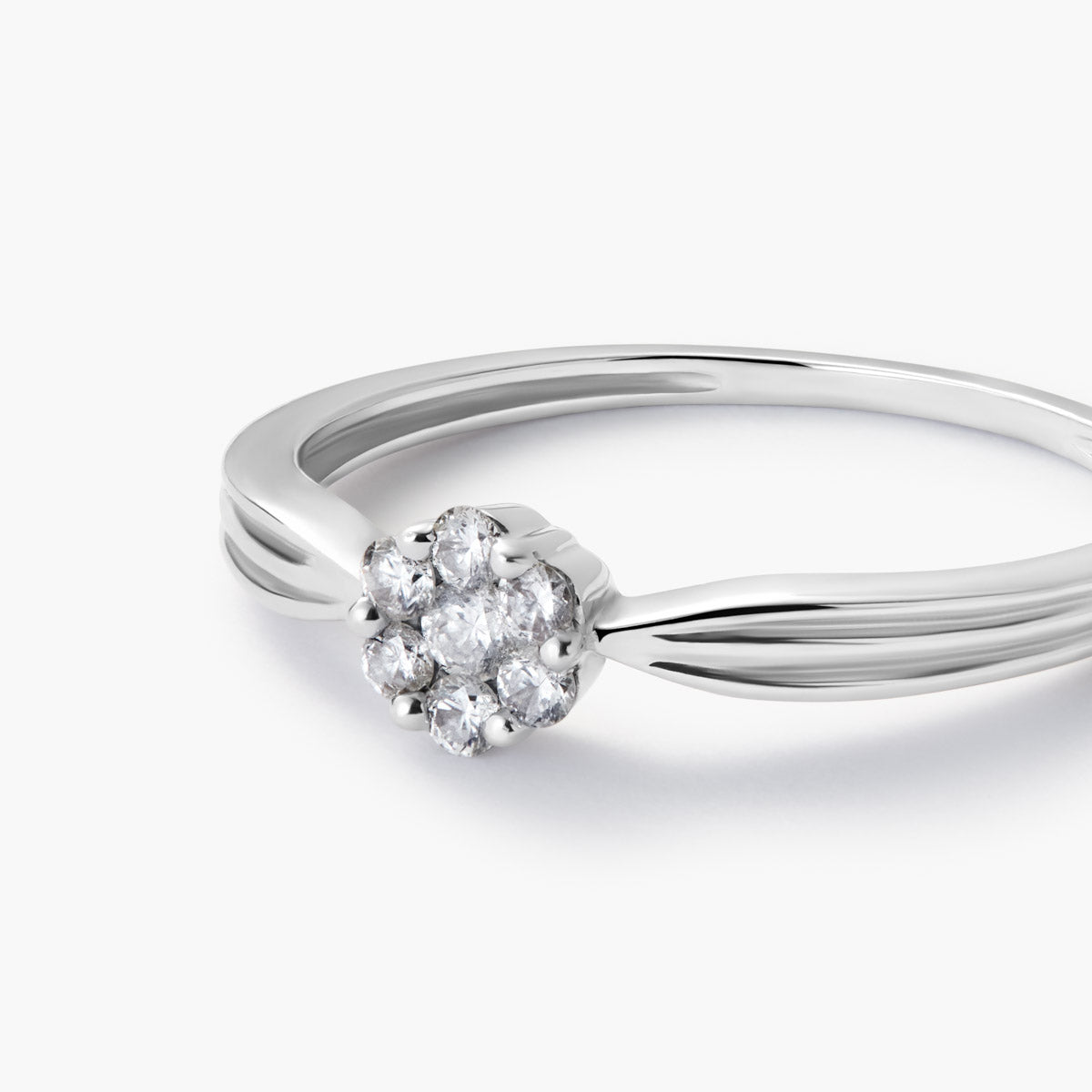 Anillo de oro blanco 18K diamante natural 0.15 ct. 