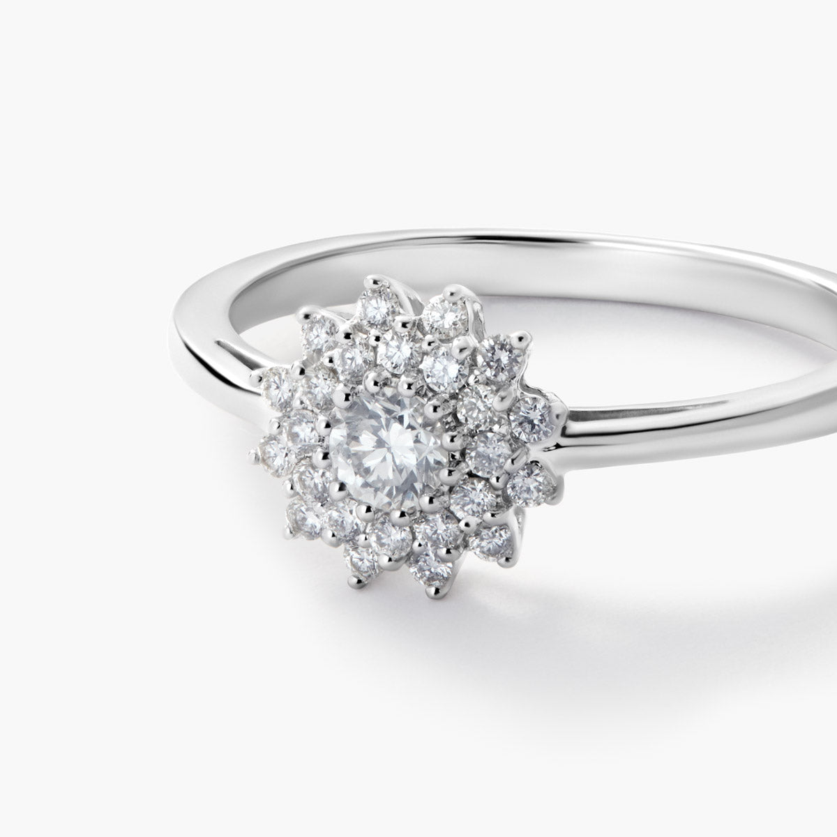Anillo de oro blanco 18K diamante natural 0.35 ct. FLORIENTAL