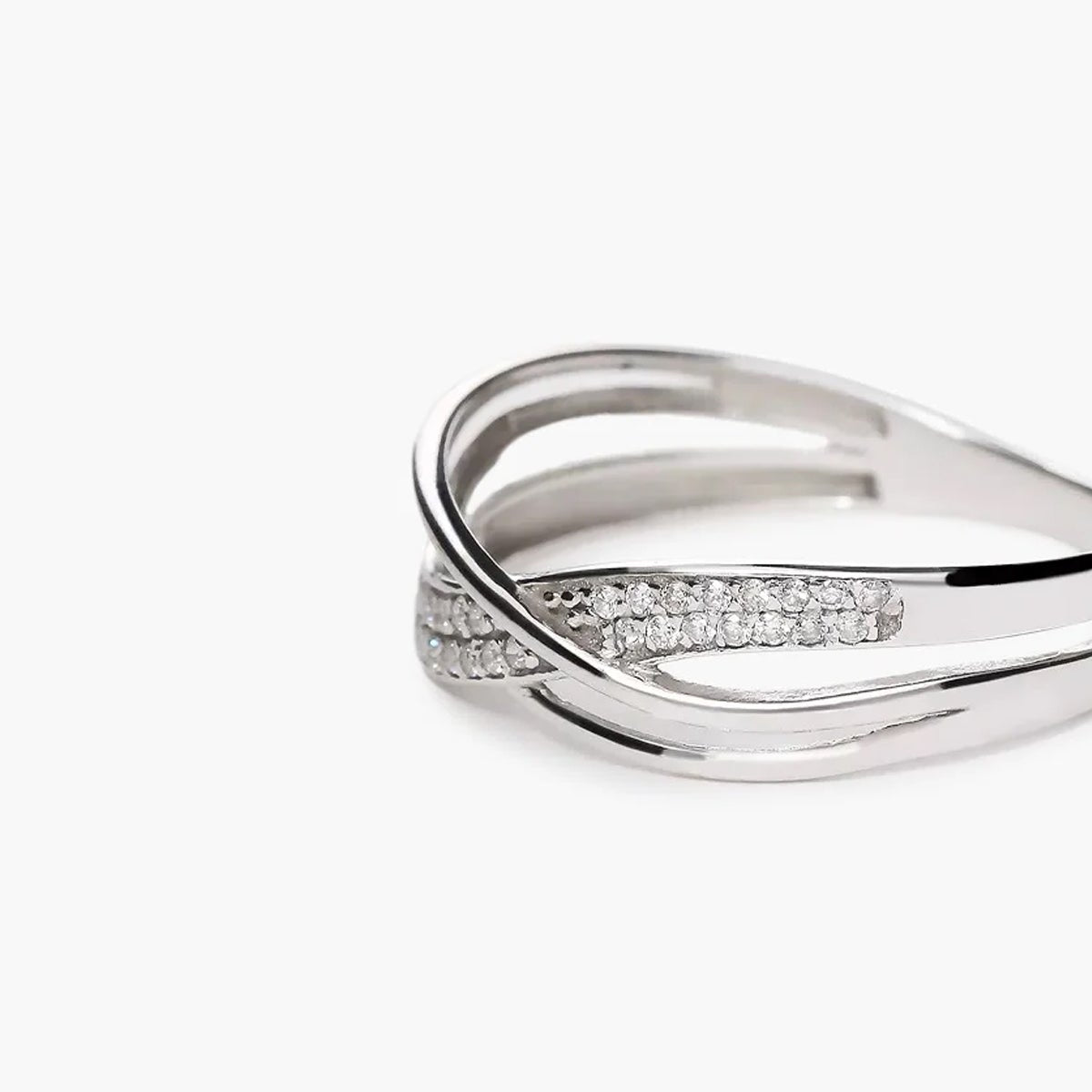 Anillo de oro blanco 18K diamante natural 0.15 ct.