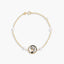 Pulsera infantil de oro 18K con perlas y virgen en nácar 15-17 cm