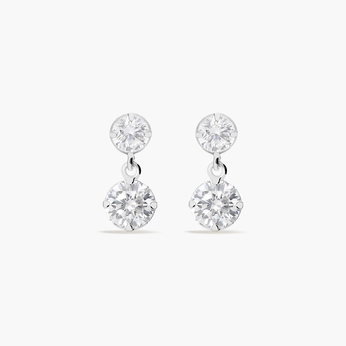 Pendientes largos de oro blanco 18K circonitas 12 mm