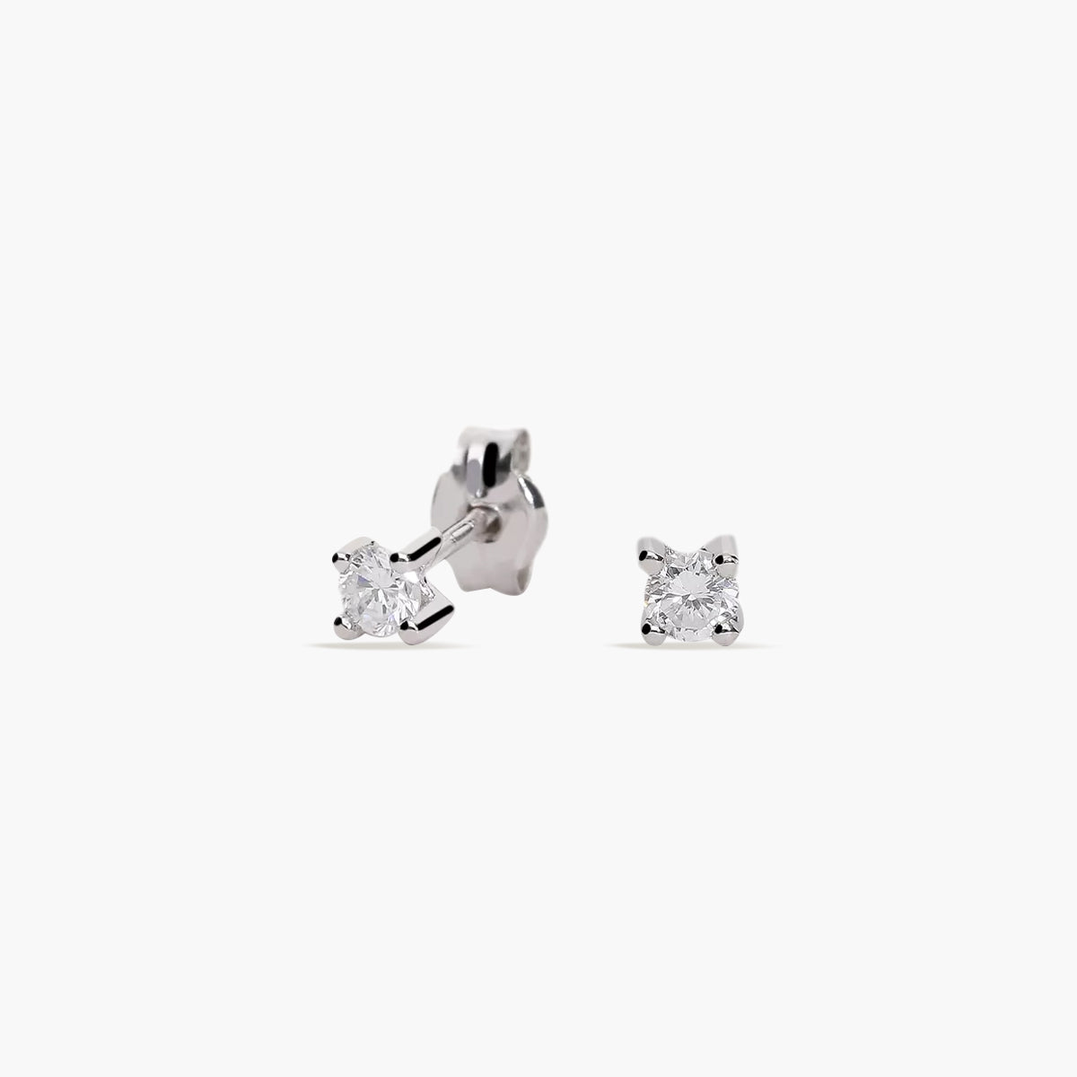 Pendientes de oro blanco 18K diamante natural 0.20 ct. 3 mm